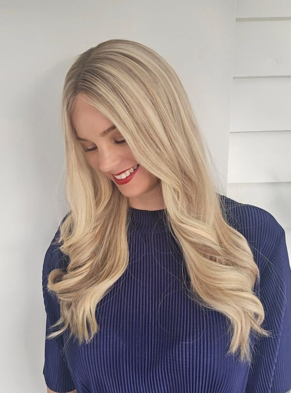 Alex human hair wig in Hahei blonde by Custom Hair Company, looknig down