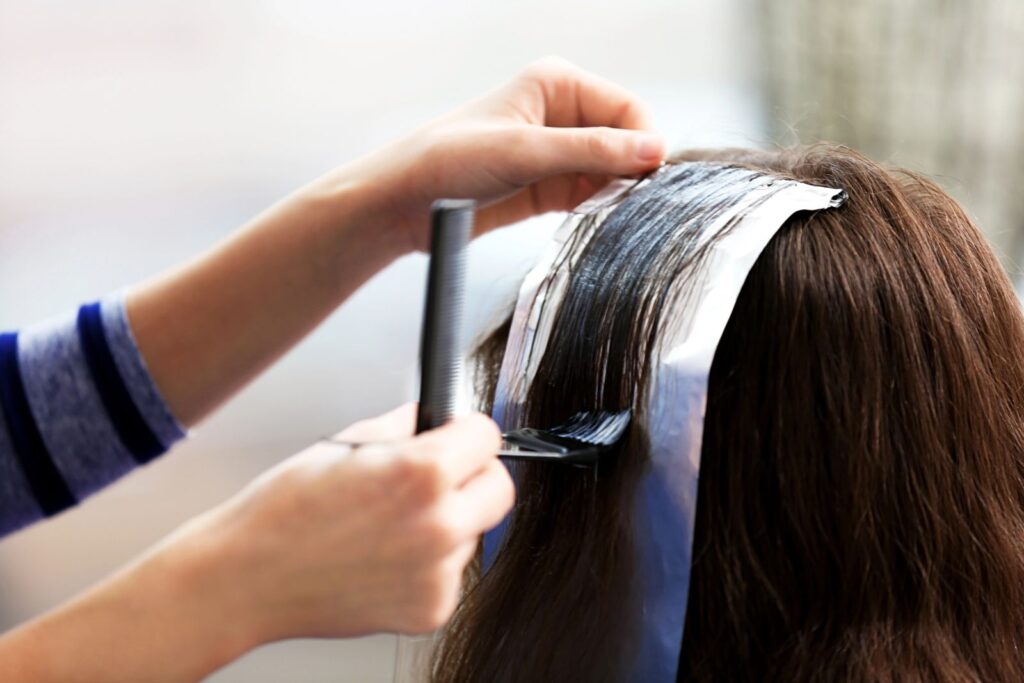 person colouring wig hair
